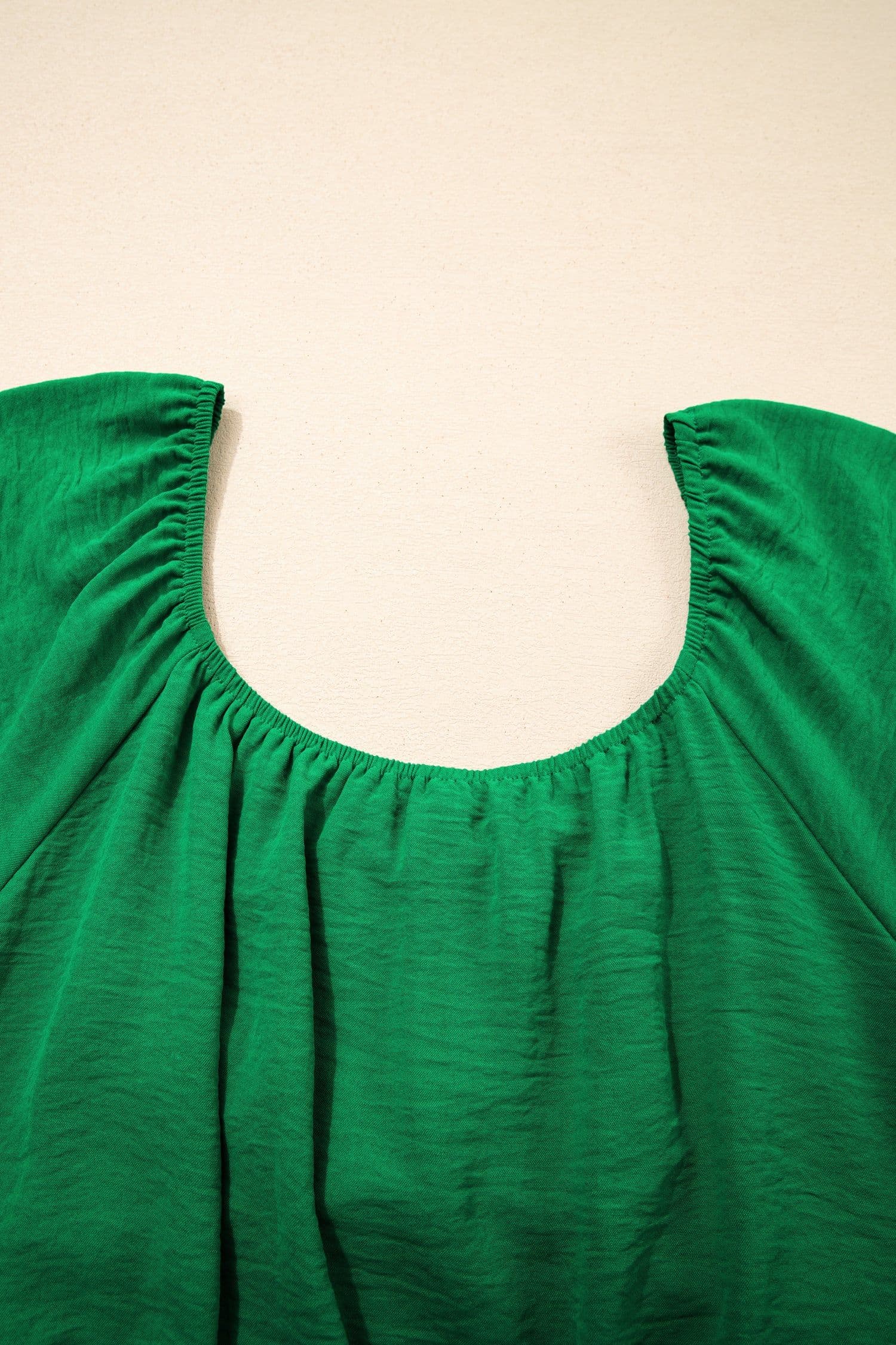 image-Dark Green Peplum Top - Ruched Waist Tied Back