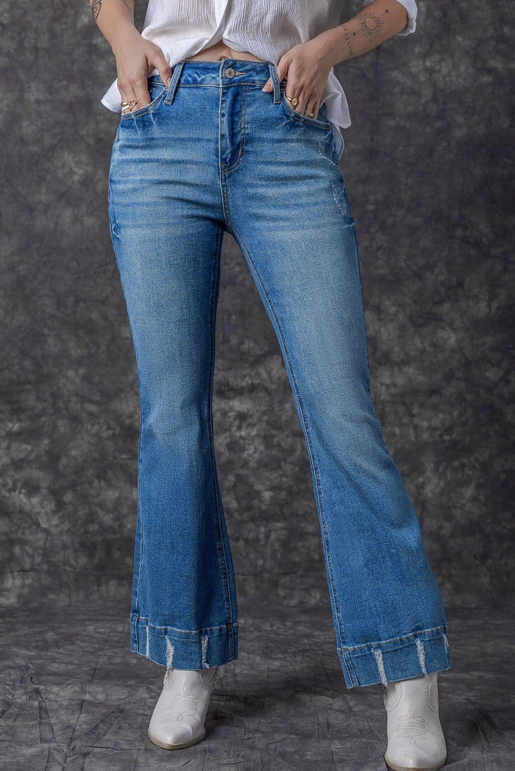 image-Sky Blue Distressed Medium Wash Flare Jeans (65 characters)