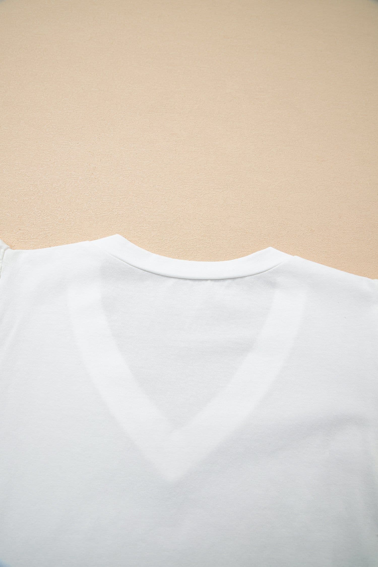 image-White Eyelet Embroidered Flutter Sleeve V-Neck Tee - 95% Cotton