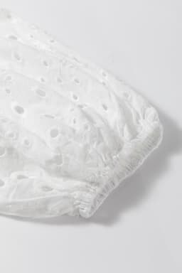 image-White Embroidered Hollow-out Puff Sleeve Blouse - Floral Design