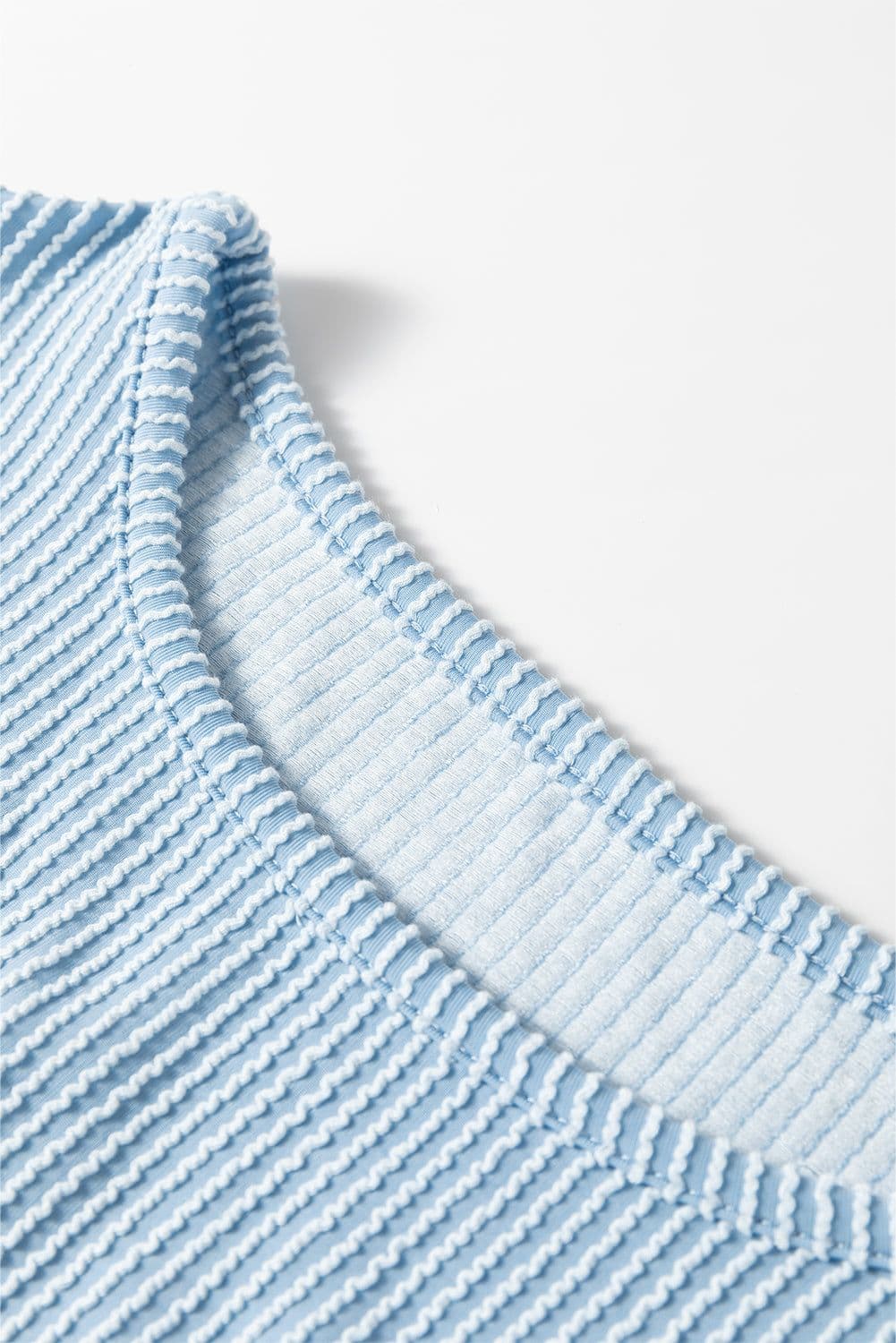 image-Mist Blue Puff Sleeve Corded Blouse with Frilly Detail (56 characters)