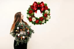 image-Floral Green Wreath Wall Decal with Red Bow - Christmas Decor Sticker