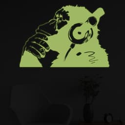 image-Banksy Glowing Vinyl Wall Decal Monkey With Headphones - Glow in Dark Chimp Listening to Music Earphones