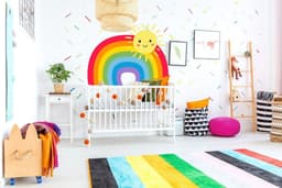 image-Vibrant Vinyl Rainbow Wall Decal - Colorful Sticker for Bedroom and Nursery Enhancement