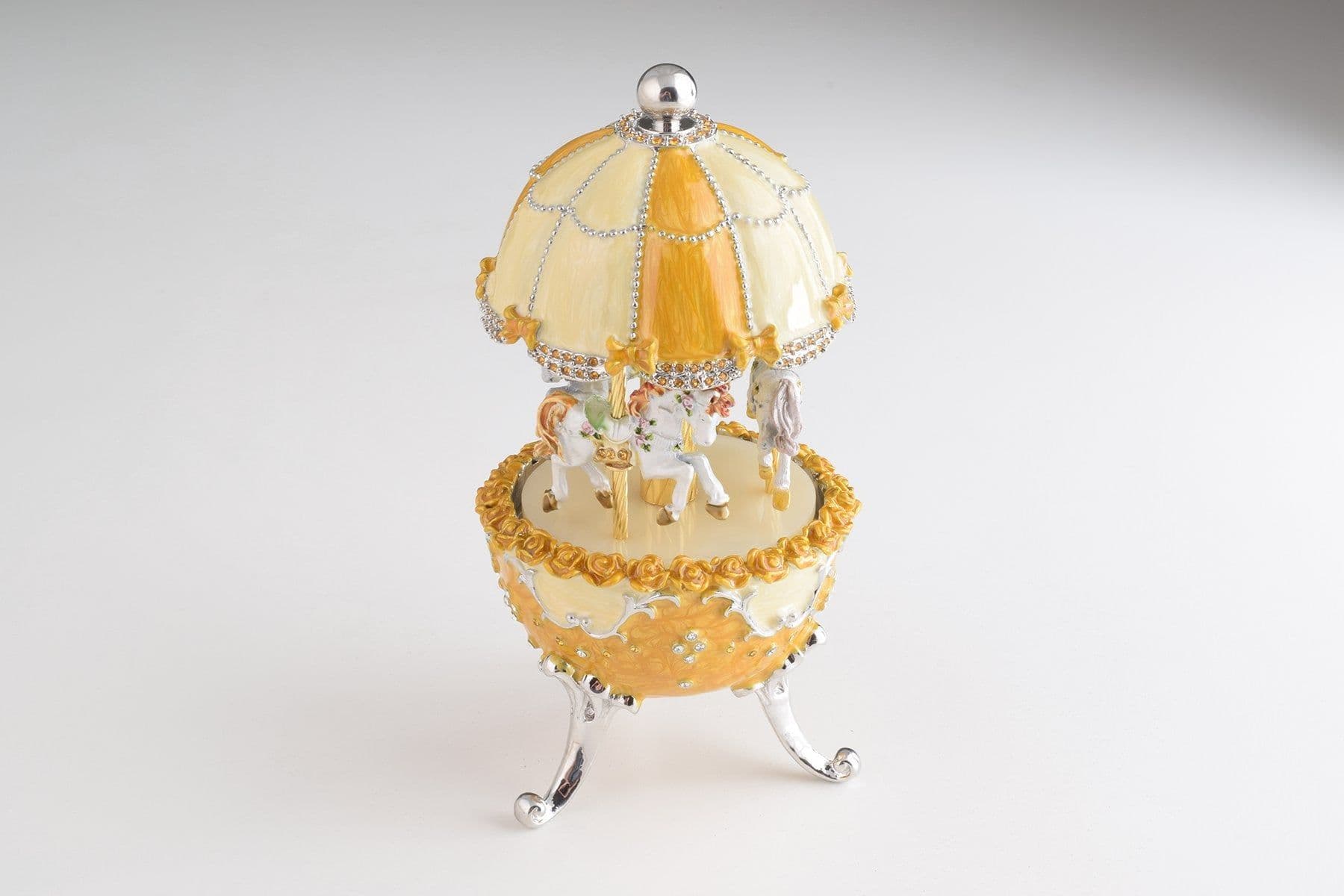 image-Yellow Faberge Egg Carousel Wind up Music Box