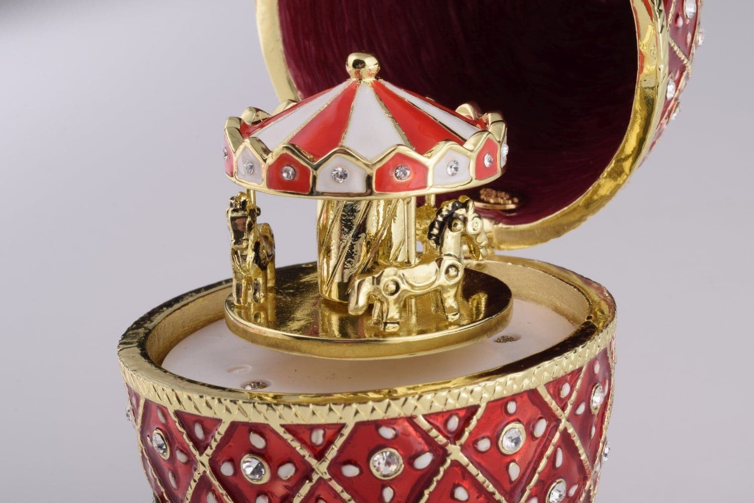 image-Red Faberge Egg with Horse Carousel Surprise Inside
