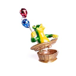 image-Frog Sitting in a Basket Holding Balloons