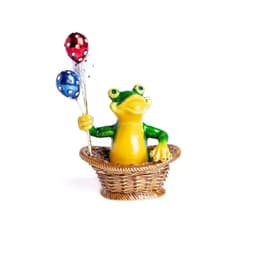 image-Frog Sitting in a Basket Holding Balloons