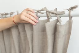 image-Natural linen curtain with tie top