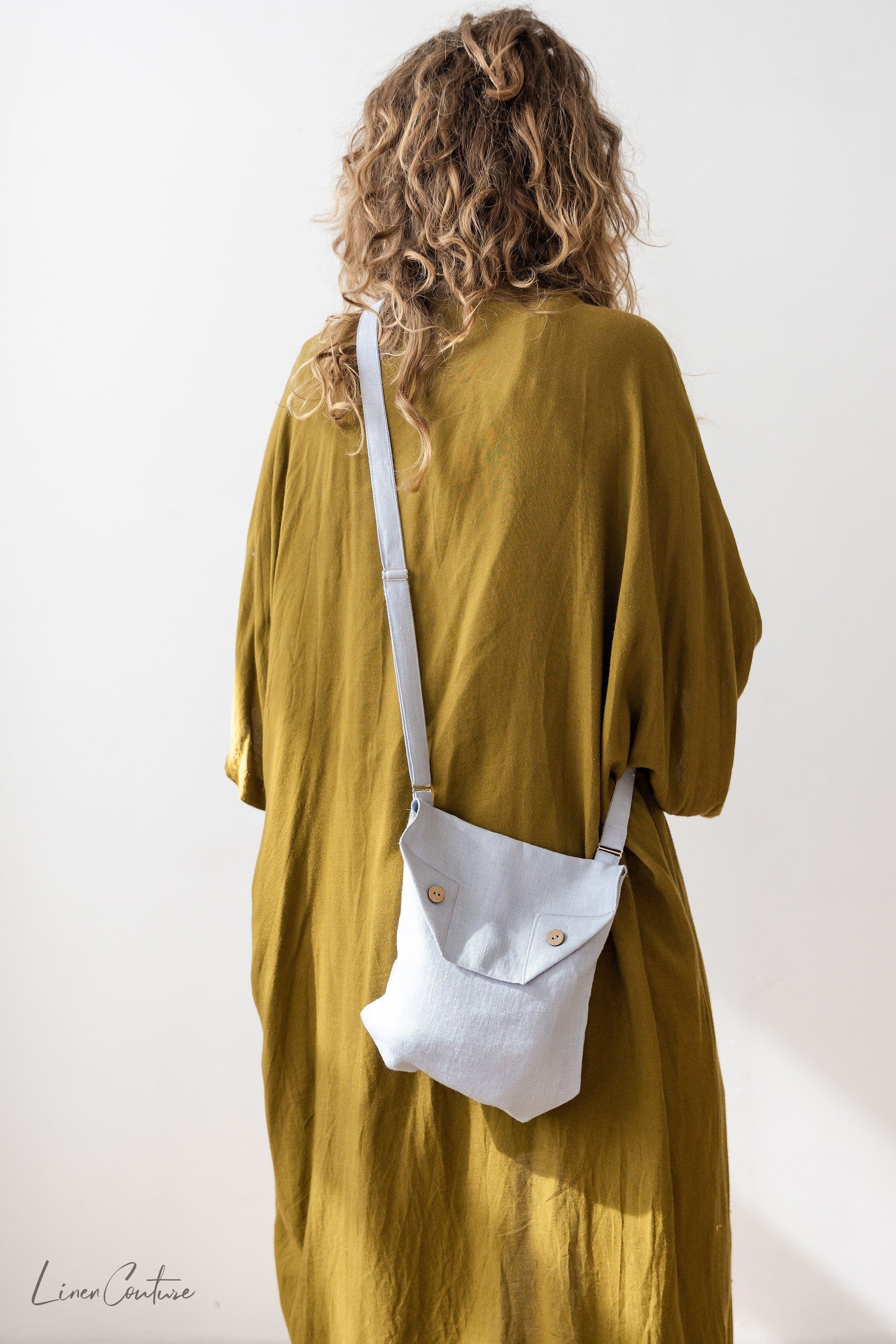 image-Ice Blue Linen Shoulder Bag with Coconut Buttons and Adjustable Strap