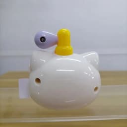 image-Bandai Hello Kitty Sticker Dispenser - Cute Doll Toy for Children Gifts