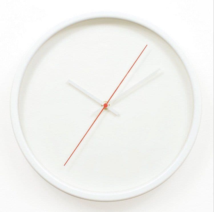 image-Simple and Elegant Metal Wall Clock