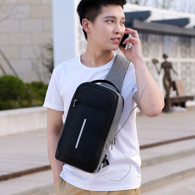 image-Anti-theft USB charging chest bag with you