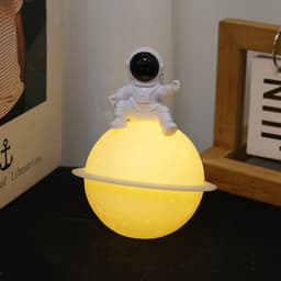 image-Astronaut Sitting in The Moon Night Light Creative Desktop Luminous Planet Lamp Ornament Home Decoration Birthday Kid Gifts