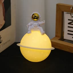image-Astronaut Sitting in The Moon Night Light Creative Desktop Luminous Planet Lamp Ornament Home Decoration Birthday Kid Gifts