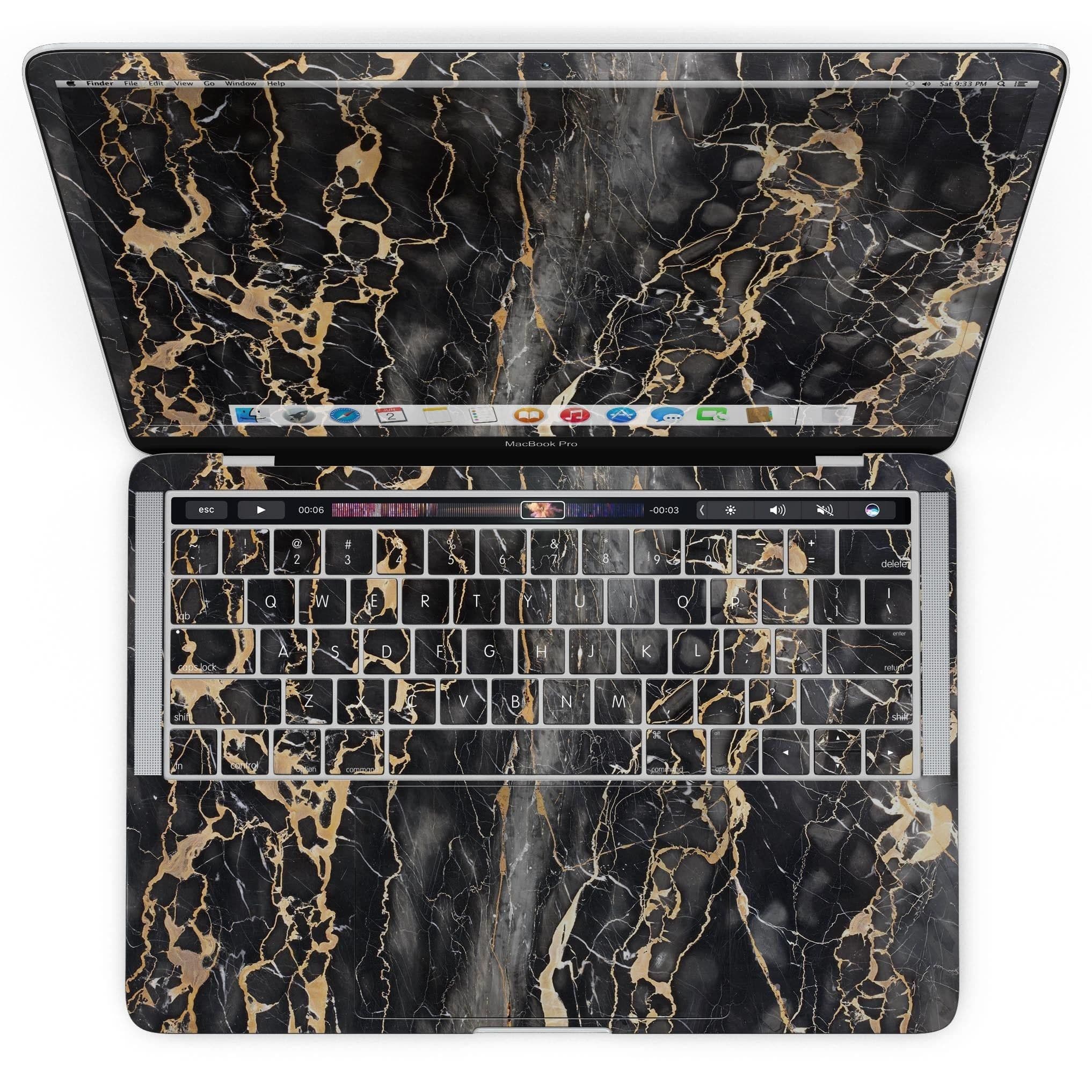 image-Black and Gold Marble Surface - MacBook Pro with Touch Bar Skin Kit