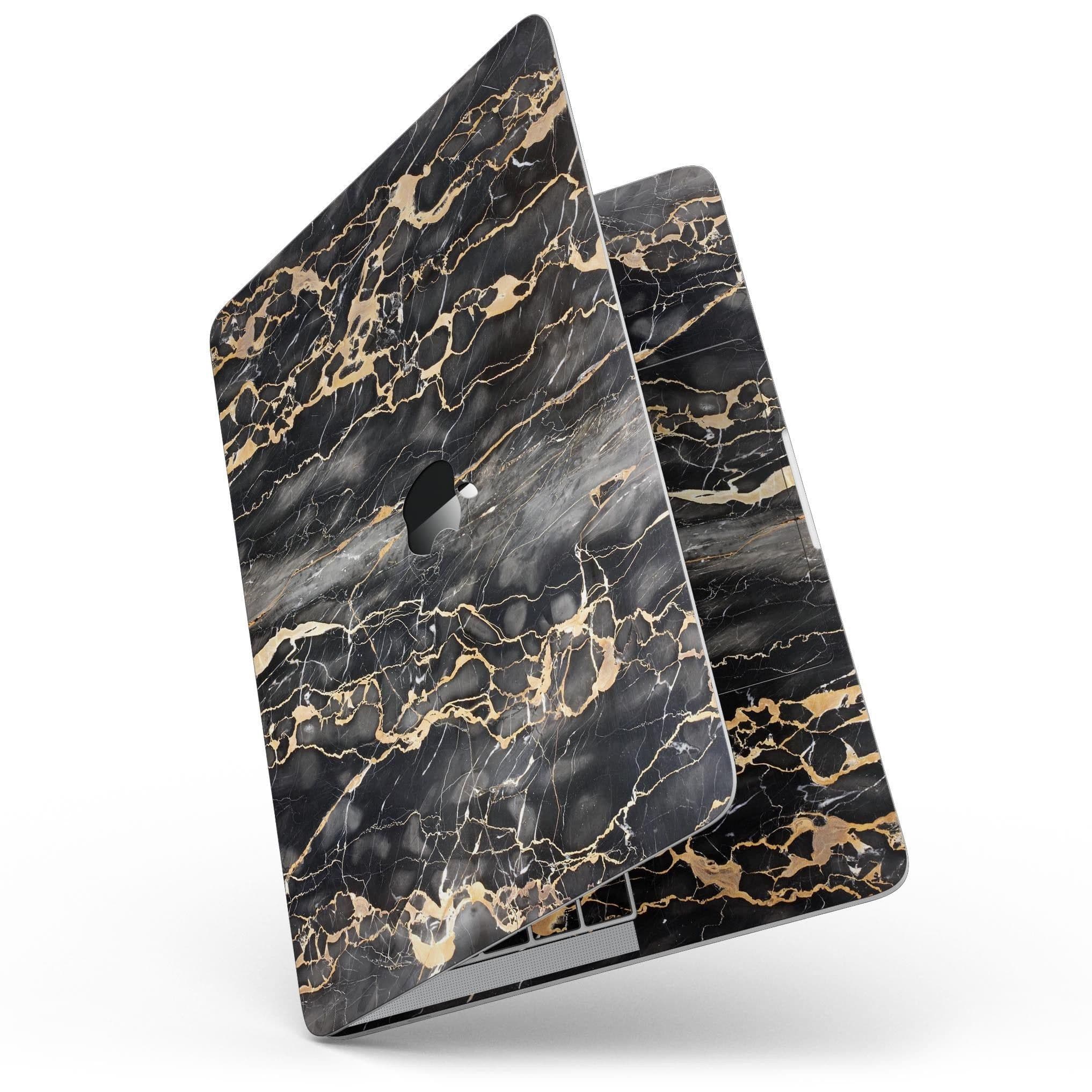 image-Black and Gold Marble Surface - MacBook Pro with Touch Bar Skin Kit
