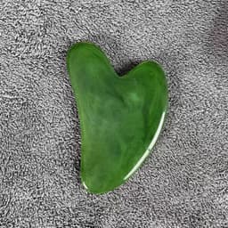 image-Resin Beeswax Heart-shaped Gu Sha Facial Scraping Sheet For Beauty Salon