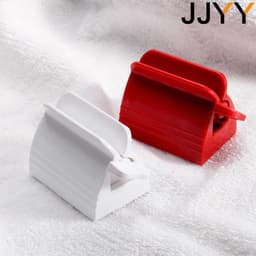 image-JJYY Portable Rolling Tube Toothpaste Squeezer Toothpaste Seat Holder Stand Rotate Toothpaste Dispensers