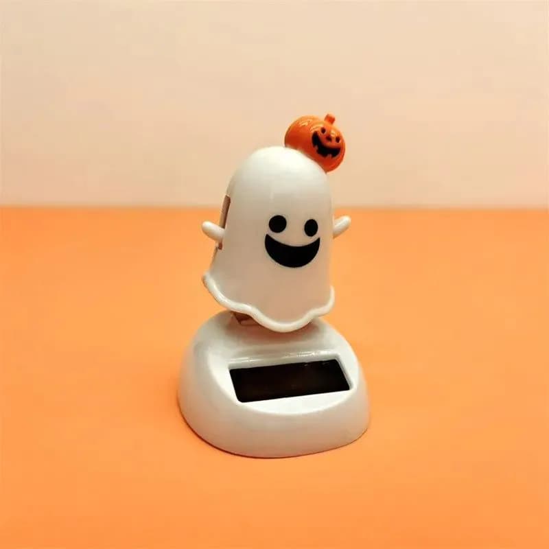image-Halloween Happy Ghost Solar Toy Funny Cartoon Cute White Pumpkin Ghost Swinging Doll Desktop Decorations Solar Car Ornament