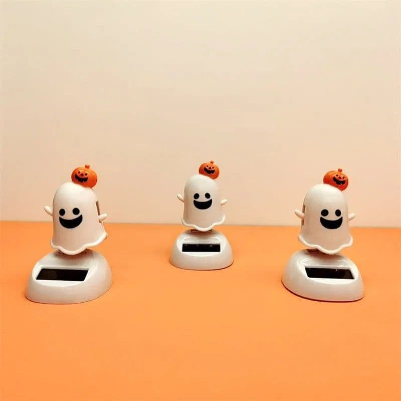 image-Halloween Happy Ghost Solar Toy Funny Cartoon Cute White Pumpkin Ghost Swinging Doll Desktop Decorations Solar Car Ornament