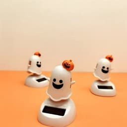 image-Halloween Happy Ghost Solar Toy Funny Cartoon Cute White Pumpkin Ghost Swinging Doll Desktop Decorations Solar Car Ornament
