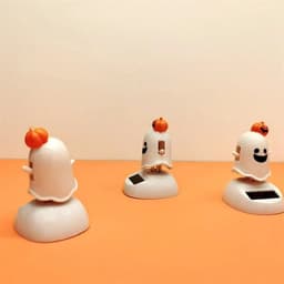 image-Halloween Happy Ghost Solar Toy Funny Cartoon Cute White Pumpkin Ghost Swinging Doll Desktop Decorations Solar Car Ornament