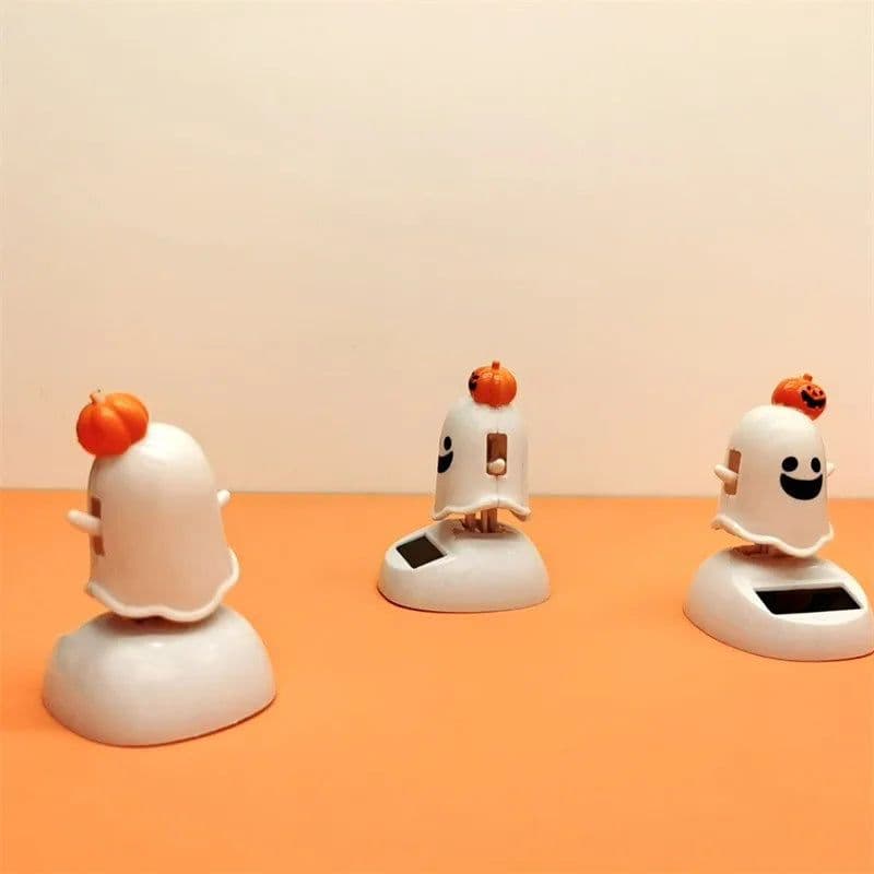 image-Halloween Happy Ghost Solar Toy Funny Cartoon Cute White Pumpkin Ghost Swinging Doll Desktop Decorations Solar Car Ornament