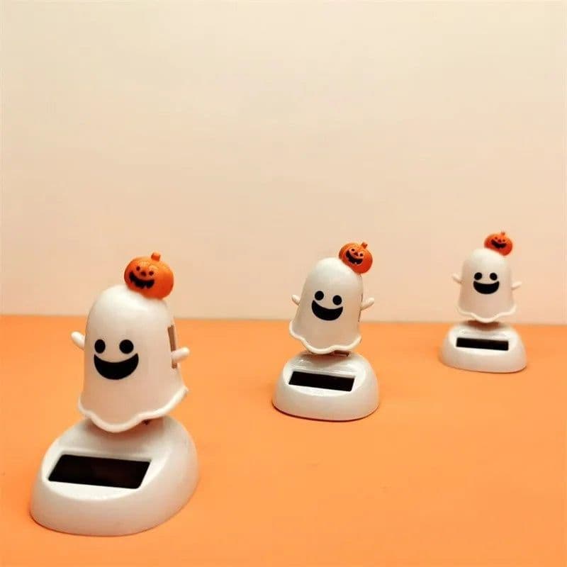 image-Halloween Happy Ghost Solar Toy Funny Cartoon Cute White Pumpkin Ghost Swinging Doll Desktop Decorations Solar Car Ornament