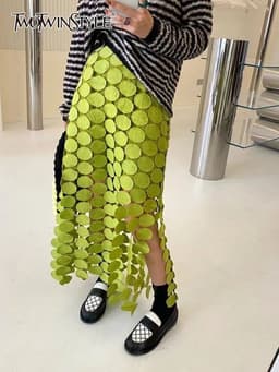 image-TWOTWINSTYLE Cut Out Skirt For Women High Waist Patchwork Tassel Irregular Hem Solid Midi Skirts Female Summer Clothing Style