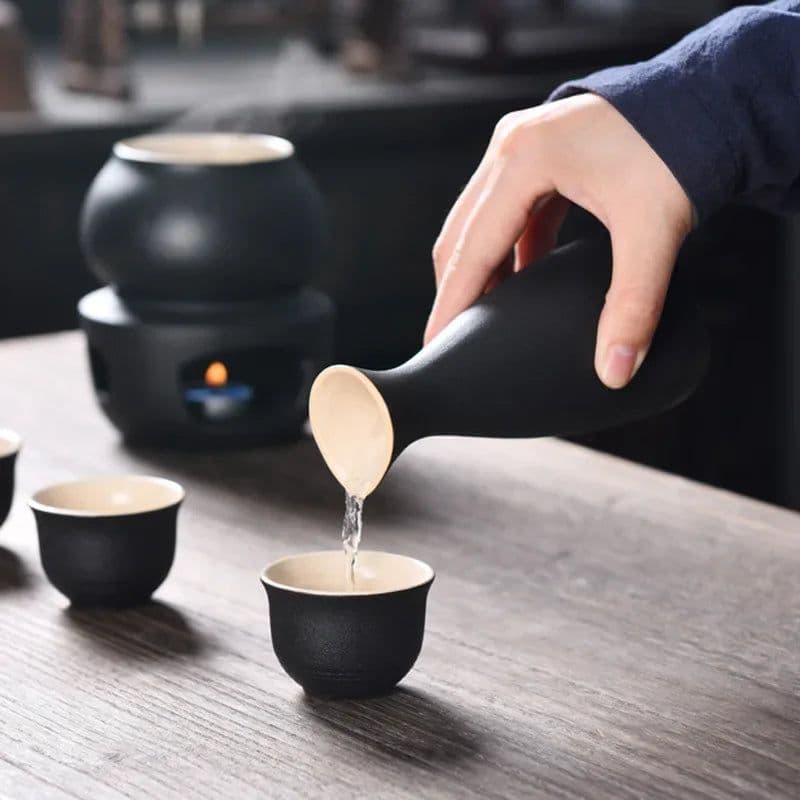 image-Ceramic Sake Set with Warmer Include 1pc Sake Bottle, 4pc Sake Cups, 1pc Warmer Cup, 1pc Candle Heating Stove