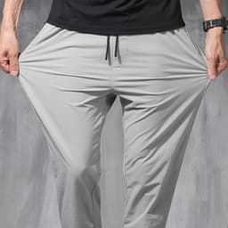 image-2024 New Korean Ice Silk Elastic Trousers Four Seasons Thin Casual Men'S Loose 9-Point Large Size Small Foot Sports Pants Spring