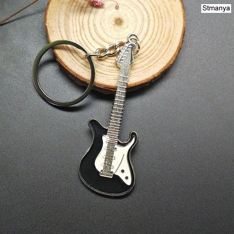 image-New Dice Key Chain Metal Personality Dice Poker Soccer Guitar Model Alloy Keychain Gift Car Key Ring 17045