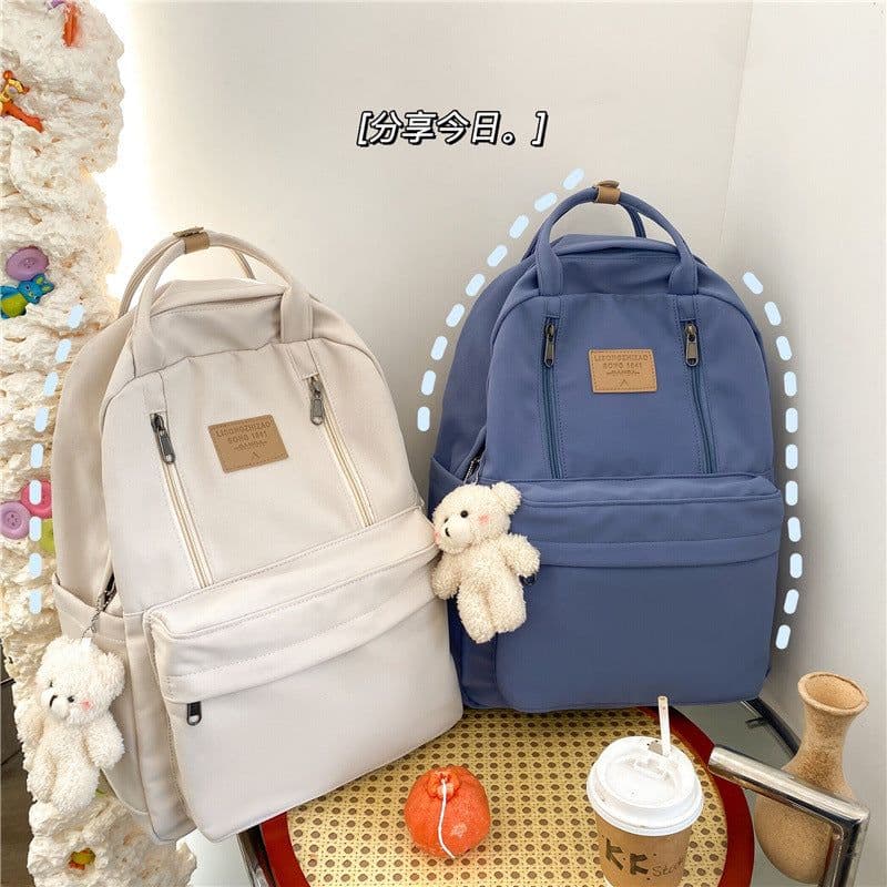 image-Schoolbag female junior high school students middle school students large-capacity backpack travel college students simple ins wild boy backpack