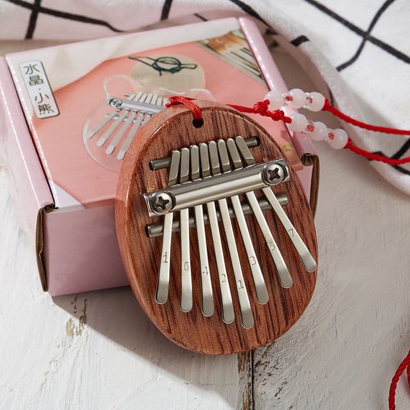 image-Tuomi 8-tone love thumb piano kalimba plate mini Kalimba thumb piano KALIMBA finger piano