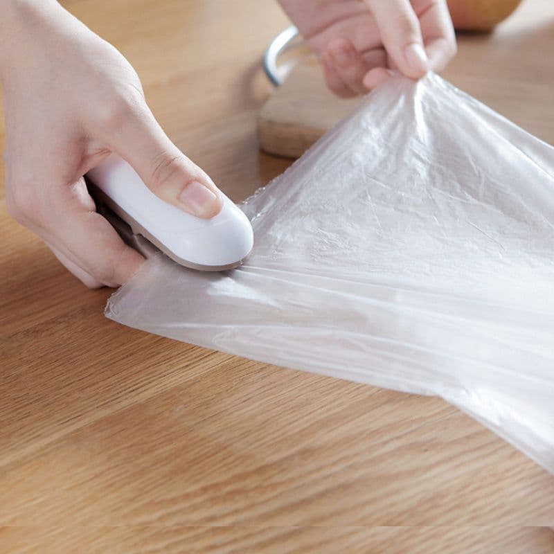 image-Portable Mini Plastic Bag Sealer - Hand Pressure