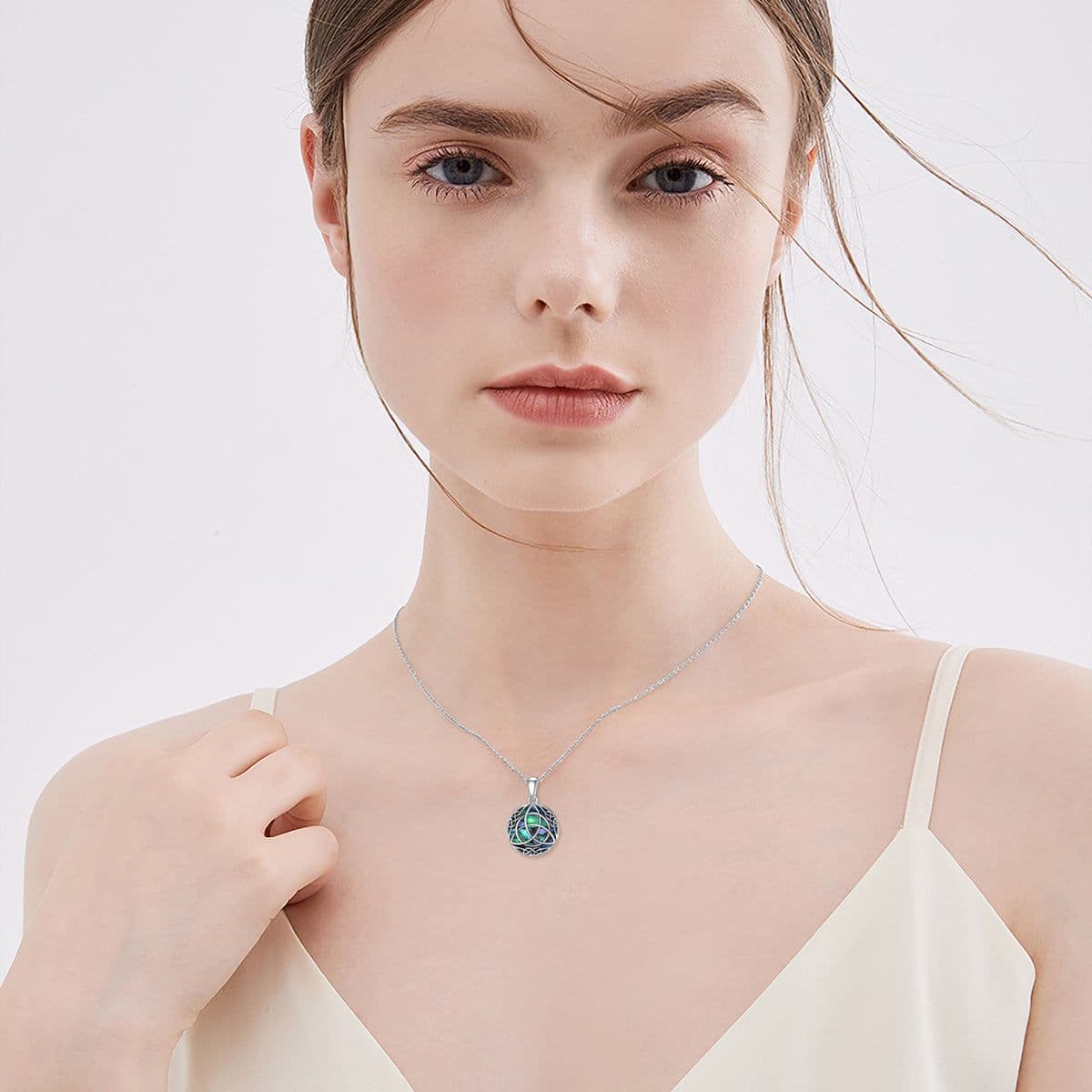 image-Vintage Sterling Silver Trinity Celtic Knot Lucky Necklace With Simulated Abalone Shell