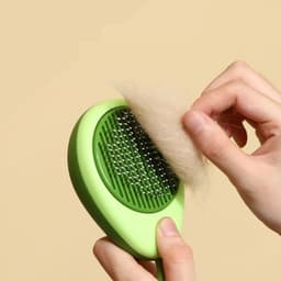 image-Creative Cat Grooming Comb Portable Massage Brush One-Button Remove Floating Hair Scraper Cats Dogs Pet Self Cleaning Tool Accessories