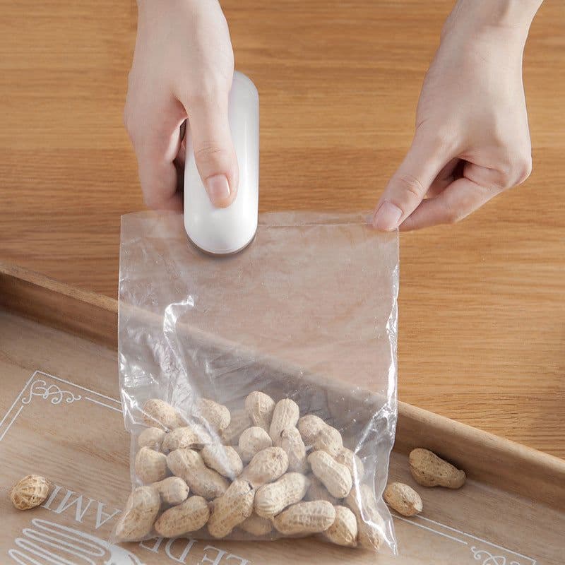 image-Portable Mini Plastic Bag Sealer - Hand Pressure