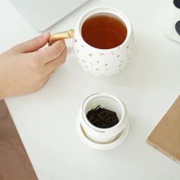 image-Ceramic Mug With Filtered Water Cup