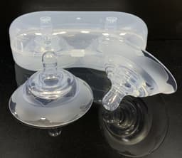 image-Mother And Baby Supplies Silicone Nipple Protector Transparent Nano Ten-hole Protector Breast Pad Breast Nipple Protector