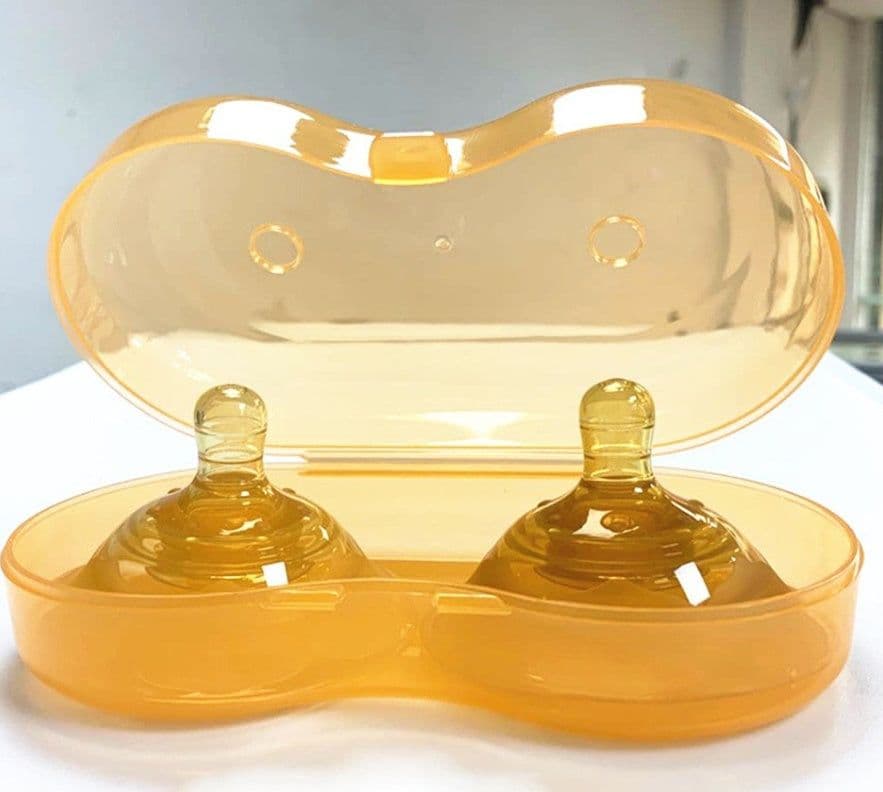 image-Mother And Baby Supplies Silicone Nipple Protector Transparent Nano Ten-hole Protector Breast Pad Breast Nipple Protector