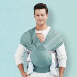 image-Newborn Hugging Baby Sling With Light Hands To Coax Sleep