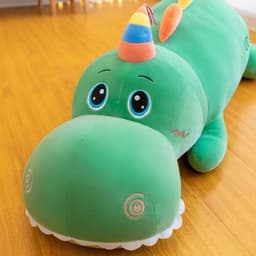 image-Cartoon large long dinosaur plush toy doll for girls to sleep on bed with legs folded and pillow as a birthday gift for girls
