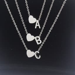 image-Cross-border hot-selling personalized fashion stainless steel pendant golden peach heart + English letters small beads A-Z couple necklace