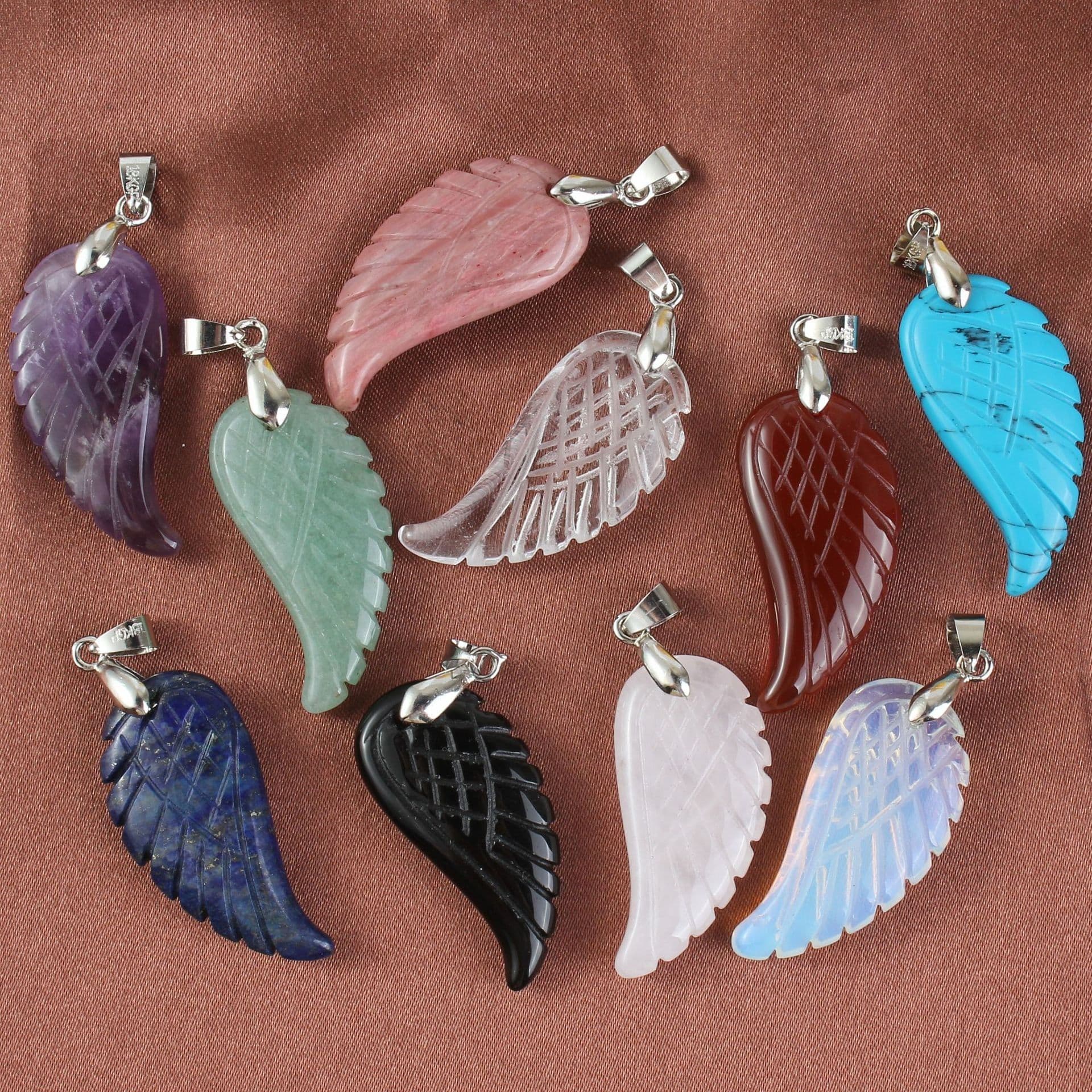 image-European and American Natural Crystal Angel Wing Pendant Carved Angel Wing Pendant Fashionable Women's Necklace Pendant