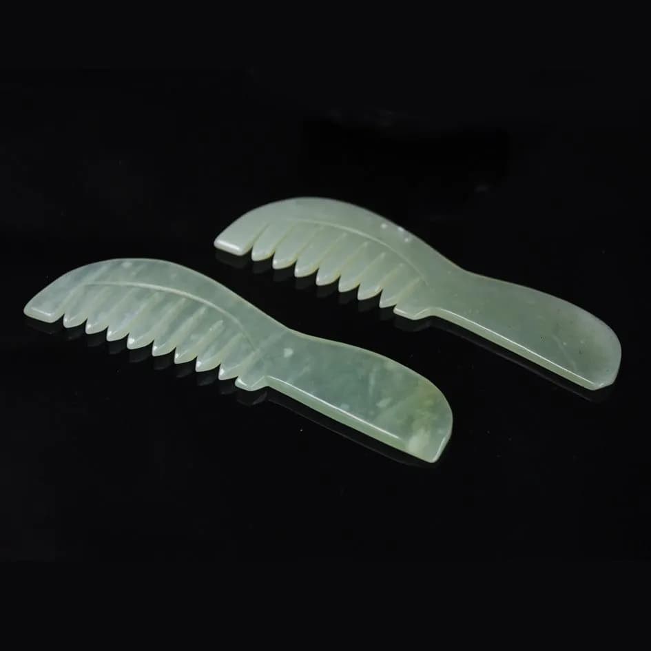 image-Manufacturers sell jade combs Xiuyu long-handled combs head massage combing meridians