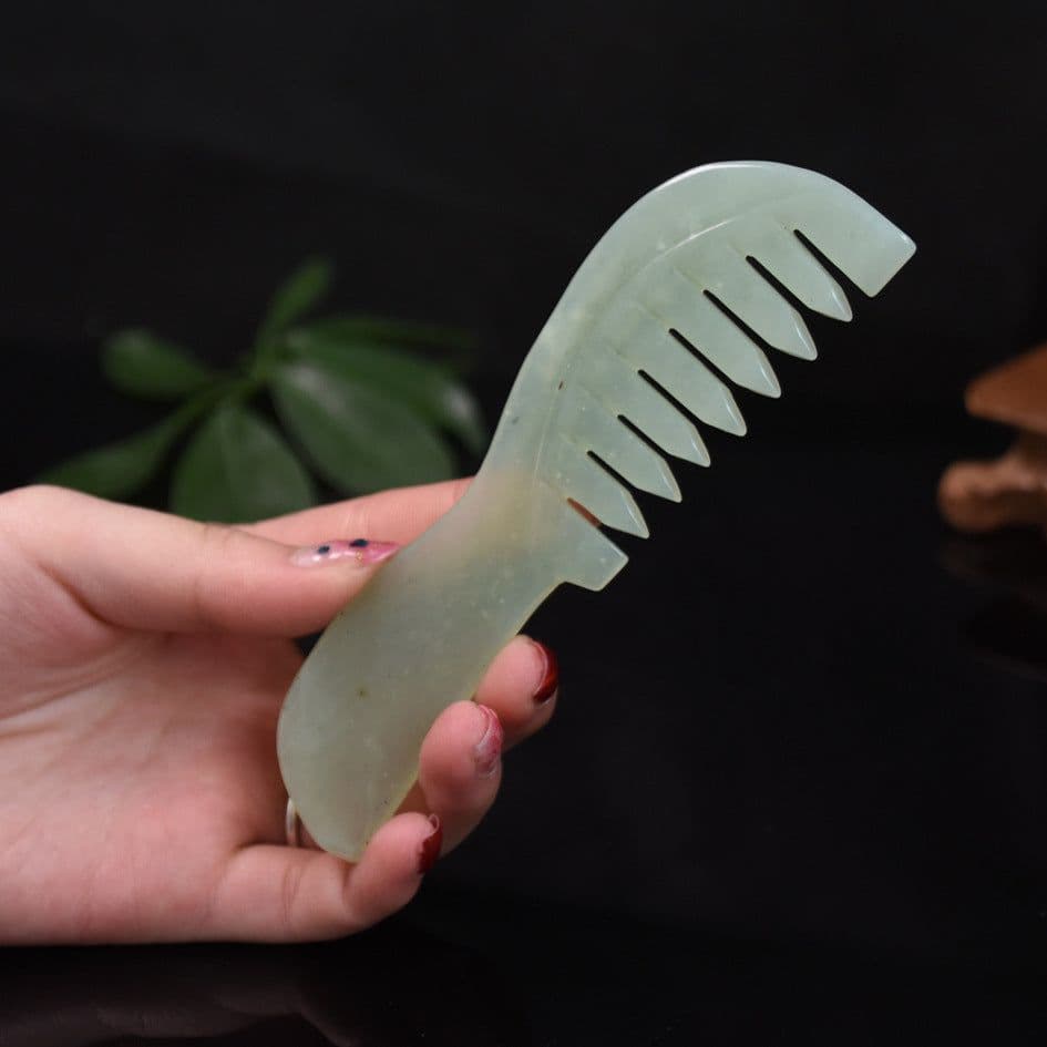 image-Manufacturers sell jade combs Xiuyu long-handled combs head massage combing meridians