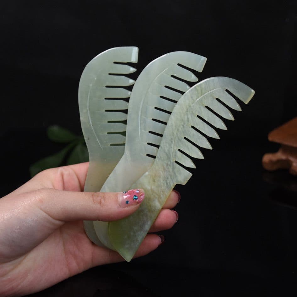 image-Manufacturers sell jade combs Xiuyu long-handled combs head massage combing meridians