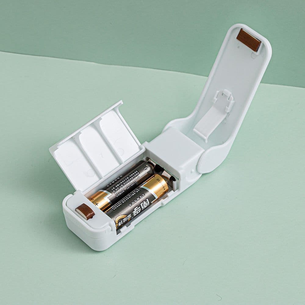image-Mini Portable Hand Pressure Sealer Plastic Bag Packaging Small Household Snack Sealer Plastic Sealing and Keeping Fresh